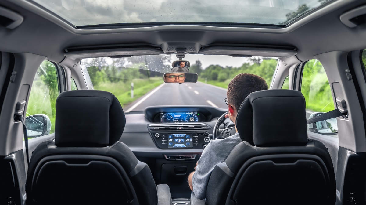 Driver on an open road illustrating vehicle safety